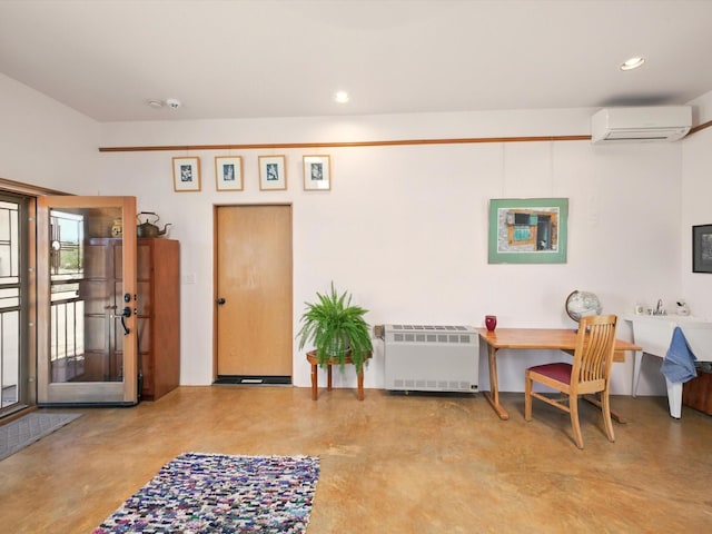 54 Encantado Loop, Santa Fe, NM 87508 - foyer featuring a wall mounted AC, concrete flooring, heating unit, and recessed lighting