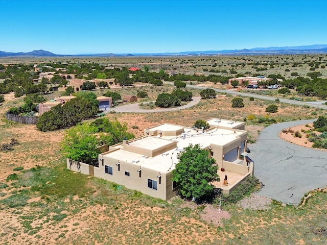 54 Encantado Loop, Santa Fe, NM 87508 - aerial view of property and surrounding area featuring a mountain backdrop and a desert landscape