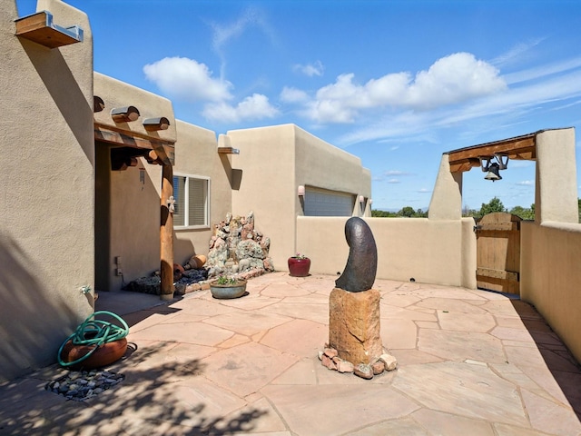 54 Encantado Loop, Santa Fe, NM 87508 - view of patio / terrace with a gate