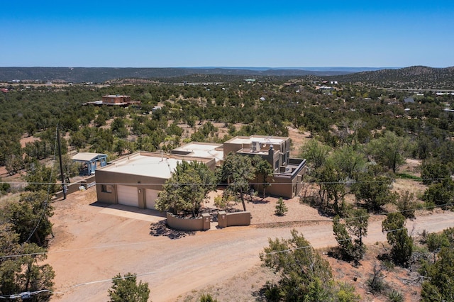 26 Apache Creek Rd, Santa Fe, NM 87505 - aerial view of property and surrounding area with a heavily wooded area