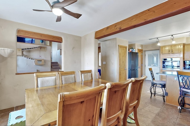 26 Apache Creek Rd, Santa Fe, NM 87505 - dining room with a ceiling fan and light tile patterned floors