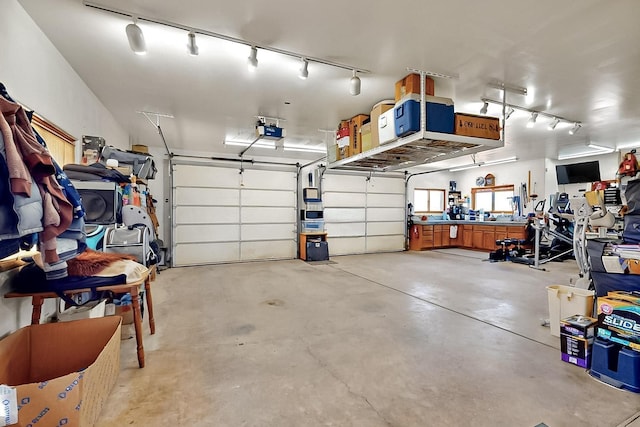 26 Apache Creek Rd, Santa Fe, NM 87505 - garage with a garage door opener