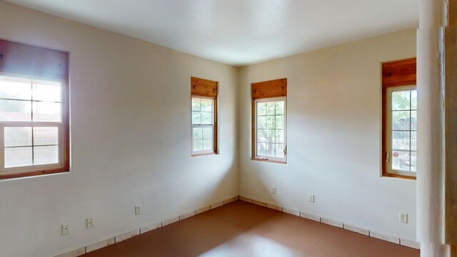 959 Acequia De Las Joyas, Santa Fe, NM 87505 - unfurnished room featuring plenty of natural light
