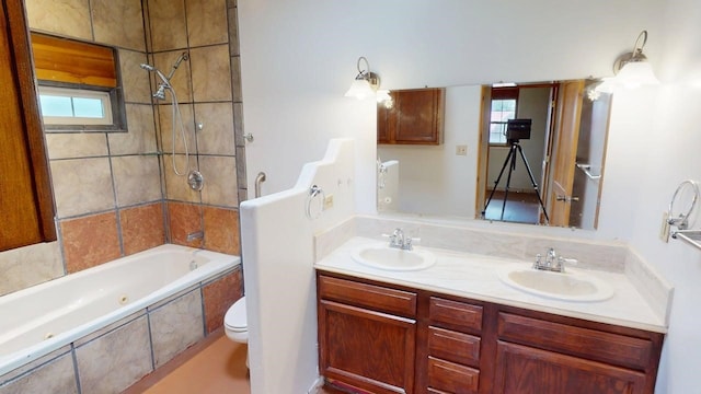 959 Acequia De Las Joyas, Santa Fe, NM 87505 - full bathroom featuring tiled shower / bath combo, plenty of natural light, toilet, and double vanity