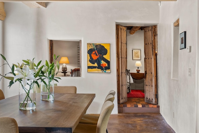 127 County Road 84, Santa Fe, NM 87506 - dining room featuring finished concrete floors