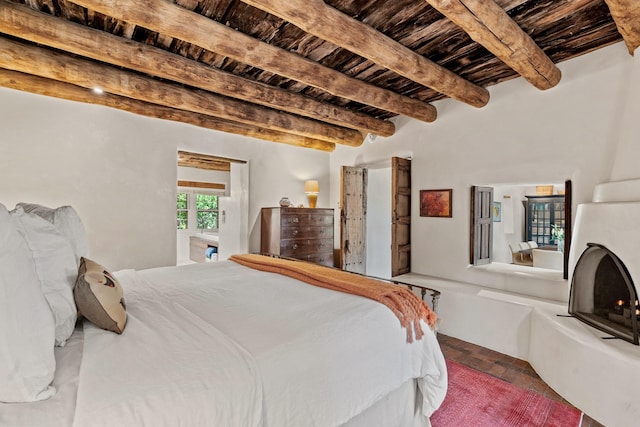 127 County Road 84, Santa Fe, NM 87506 - bedroom with wooden ceiling and beam ceiling