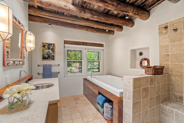 127 County Road 84, Santa Fe, NM 87506 - bathroom with wooden ceiling, beamed ceiling, a bath, and vanity