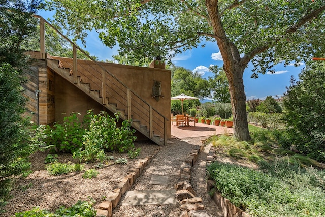 127 County Road 84, Santa Fe, NM 87506 - view of yard featuring stairway and a patio area