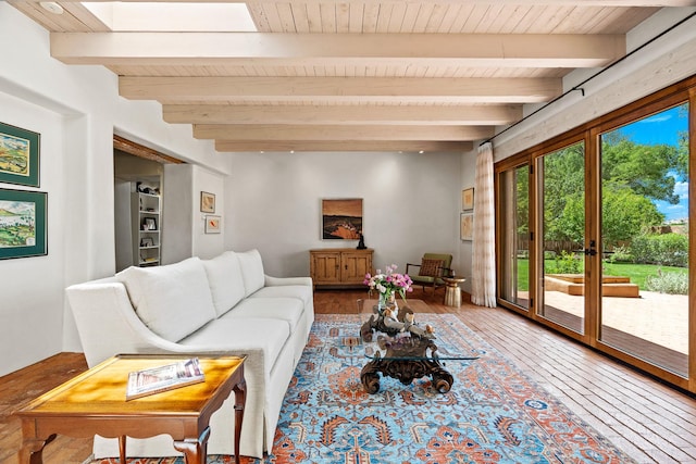 127 County Road 84, Santa Fe, NM 87506 - living room with wood ceiling, beam ceiling, and wood finished floors