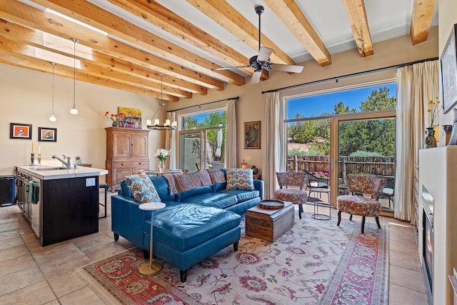 878 Viento Segundo Dr Unit 12, Santa Fe, NM 87501 - living area with beam ceiling and ceiling fan