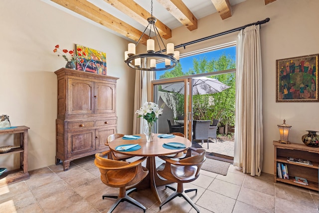 878 Viento Segundo Dr Unit 12, Santa Fe, NM 87501 - dining room featuring a chandelier and beamed ceiling