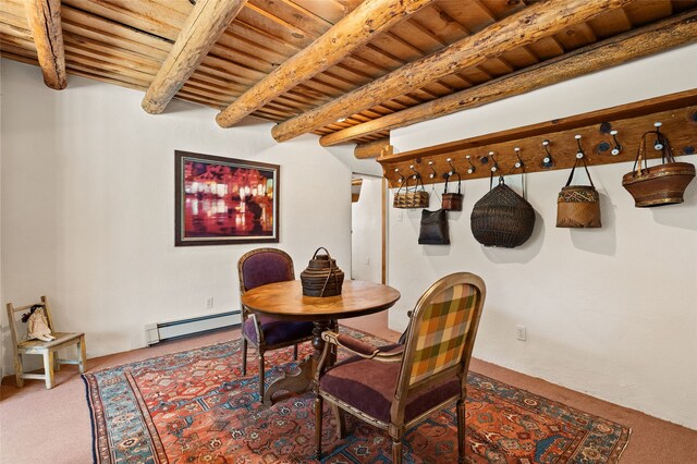 17 Tano W, Santa Fe, NM 87506 - dining space featuring a baseboard radiator, wooden ceiling with exposed beams, and carpet flooring