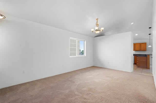 1905 Mendius, Los Alamos, NM 87544 - unfurnished living room with light colored carpet, a chandelier, and recessed lighting