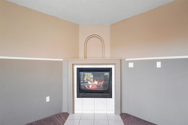 1905 Mendius, Los Alamos, NM 87544 - detailed view of a multi sided fireplace, a textured ceiling, and carpet floors
