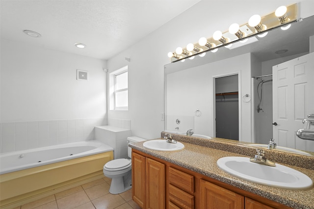1905 Mendius, Los Alamos, NM 87544 - bathroom with tile patterned flooring, a bath, double vanity, and toilet