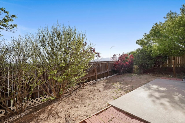1905 Mendius, Los Alamos, NM 87544 - fenced backyard featuring a patio area