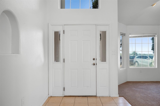 1905 Mendius, Los Alamos, NM 87544 - entryway with light carpet, light tile patterned floors, and arched walkways