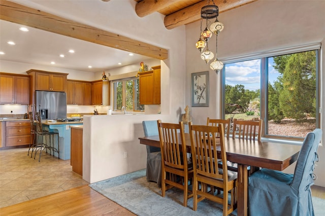 2 Tierra Grande, Santa Fe, NM 87506 - dining room with recessed lighting, beamed ceiling, and light wood finished floors