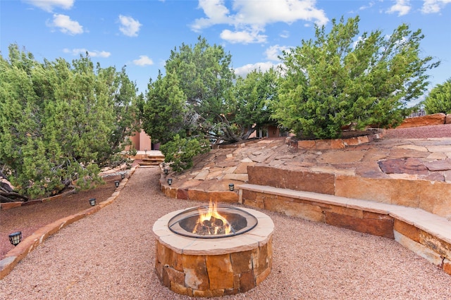 2 Tierra Grande, Santa Fe, NM 87506 - view of patio featuring a fire pit