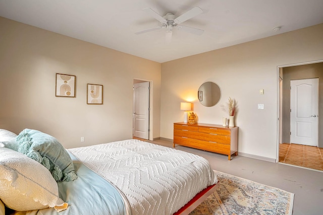 4548 Contenta Rdg, Santa Fe, NM 87507 - bedroom with baseboards, finished concrete floors, and a ceiling fan