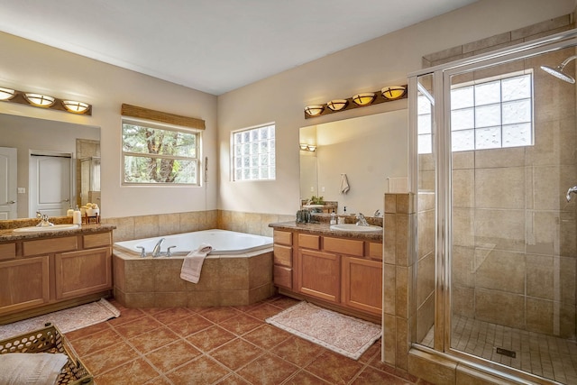 4548 Contenta Rdg, Santa Fe, NM 87507 - full bath with plenty of natural light, a stall shower, a bath, and two vanities
