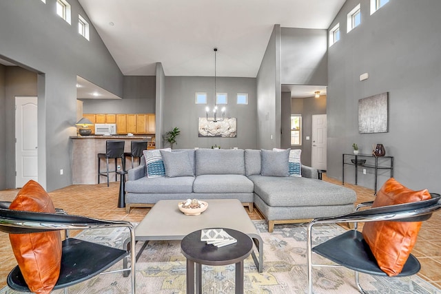 4548 Contenta Rdg, Santa Fe, NM 87507 - living area featuring high vaulted ceiling and a chandelier