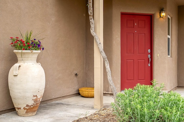4548 Contenta Rdg, Santa Fe, NM 87507 - doorway to property featuring stucco siding