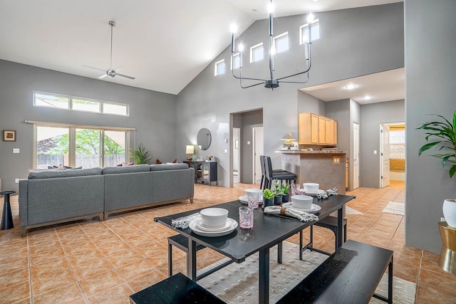 4548 Contenta Rdg, Santa Fe, NM 87507 - dining space featuring high vaulted ceiling, ceiling fan, and light tile patterned flooring