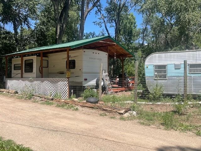 6 Rainbow Trout Ln, Pecos, NM 87552 - view of front of property with a carport