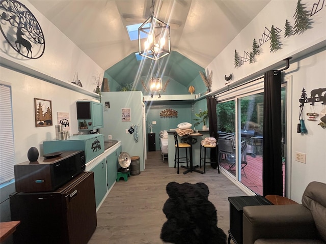 6 Rainbow Trout Ln, Pecos, NM 87552 - kitchen with wood finished floors, lofted ceiling, and green cabinets