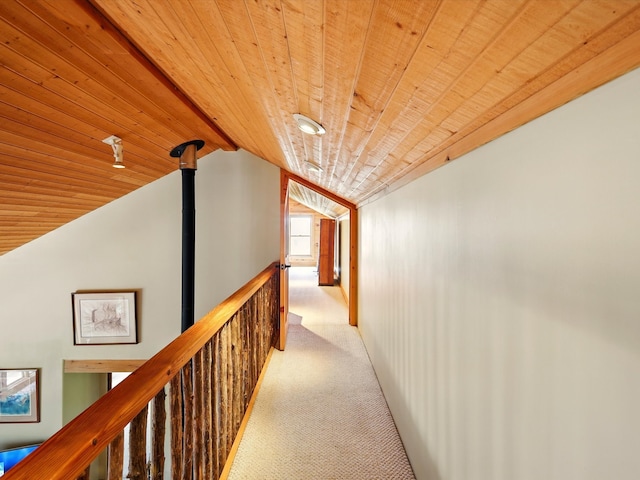 125 Apache Canyon Trl, Santa Fe, NM 87505 - hall with wood ceiling, carpet flooring, lofted ceiling, and an upstairs landing