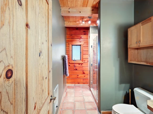 125 Apache Canyon Trl, Santa Fe, NM 87505 - bathroom featuring wooden ceiling with exposed beams and toilet