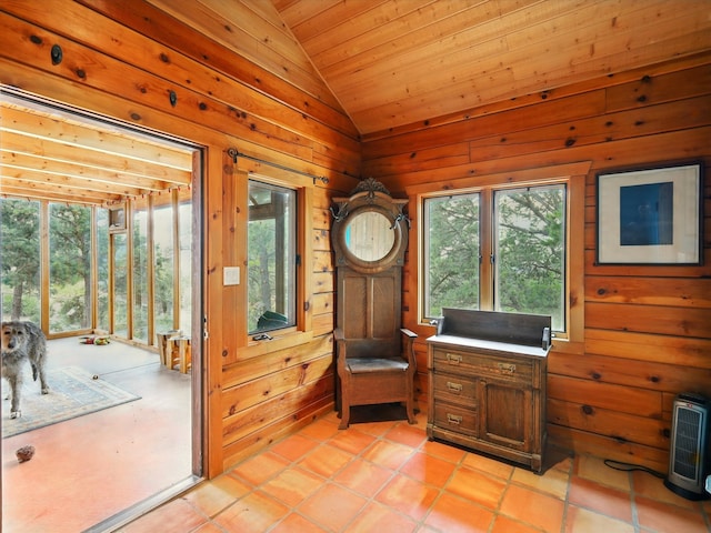 125 Apache Canyon Trl, Santa Fe, NM 87505 - living area featuring lofted ceiling, plenty of natural light, wood walls, wooden ceiling, and heating unit
