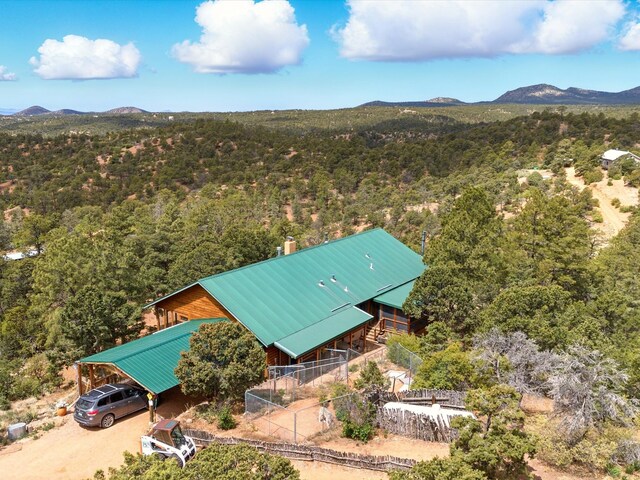 125 Apache Canyon Trl, Santa Fe, NM 87505 - view of subject property featuring mountains and a heavily wooded area