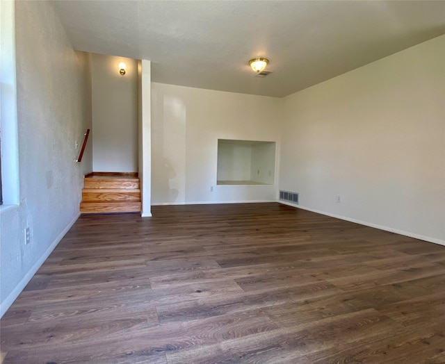 421 Maple Ave, Chama, NM 87520 - empty room featuring dark wood-style floors and baseboards