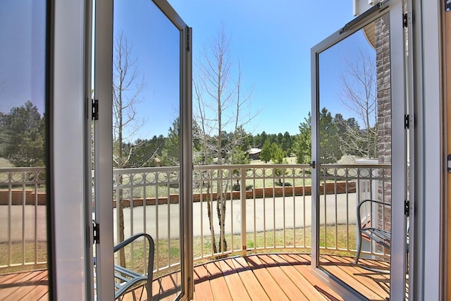 44 Sage Ln Unit 212, Angel Fire, NM 87710 - unfurnished sunroom featuring view of scattered trees