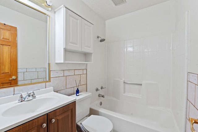 1024 Camino Vista Aurora, Santa Fe, NM 87507 - bathroom featuring tile walls, shower / tub combination, vanity, and toilet