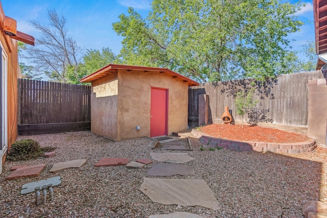 1024 Camino Vista Aurora, Santa Fe, NM 87507 - view of shed featuring a fenced backyard