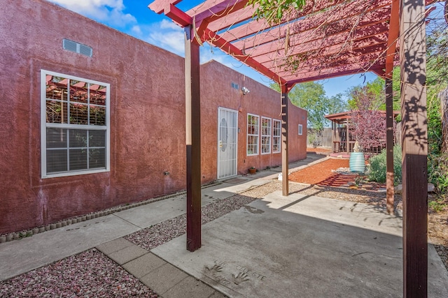1024 Camino Vista Aurora, Santa Fe, NM 87507 - view of patio with a pergola