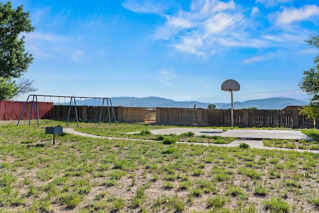 1024 Camino Vista Aurora, Santa Fe, NM 87507 - view of yard with a playground and a mountain view