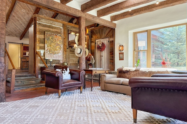 1330 Cerro Gordo Unit F, Santa Fe, NM 87501 - living area featuring wood walls, a barn door, and stairs