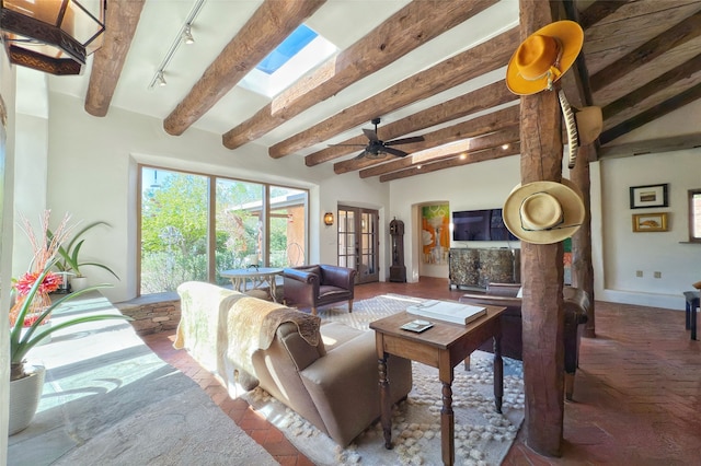 1330 Cerro Gordo Unit F, Santa Fe, NM 87501 - living room with beam ceiling, track lighting, ceiling fan, and french doors