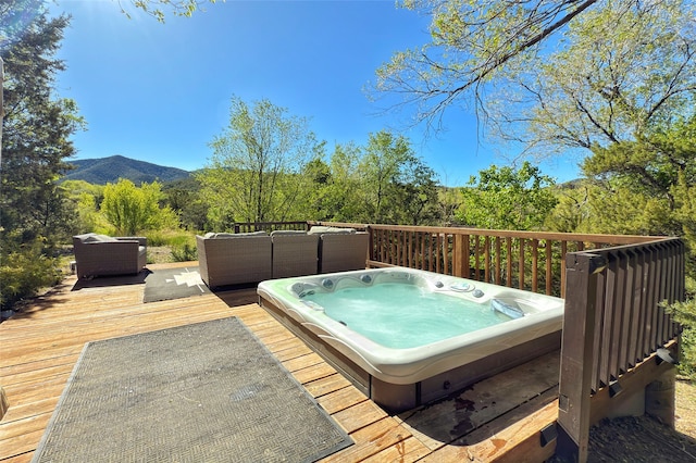 1330 Cerro Gordo Unit F, Santa Fe, NM 87501 - wooden deck featuring an outdoor hangout area and a mountain view