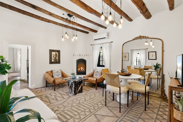 824 Dunlap St Unit A, Santa Fe, NM 87501 - living room with a wall mounted air conditioner, beamed ceiling, a high ceiling, and a fireplace