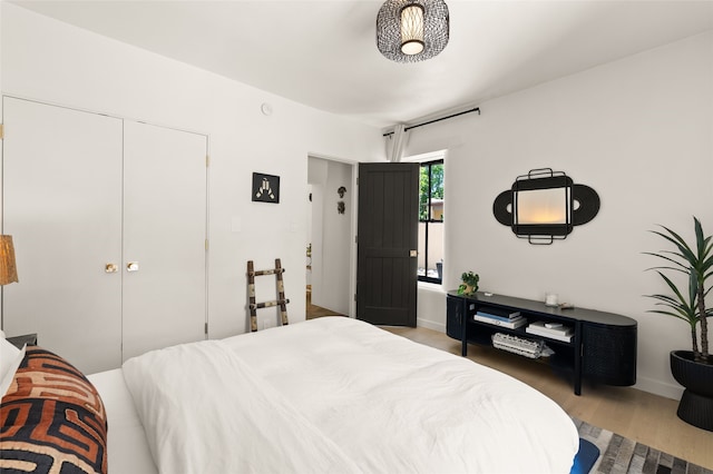 824 Dunlap St Unit A, Santa Fe, NM 87501 - bedroom with wood finished floors and baseboards