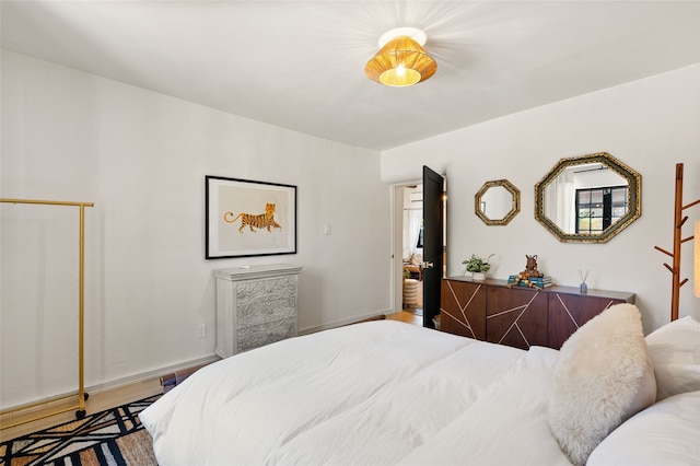 824 Dunlap St Unit A, Santa Fe, NM 87501 - bedroom featuring wood finished floors and baseboards