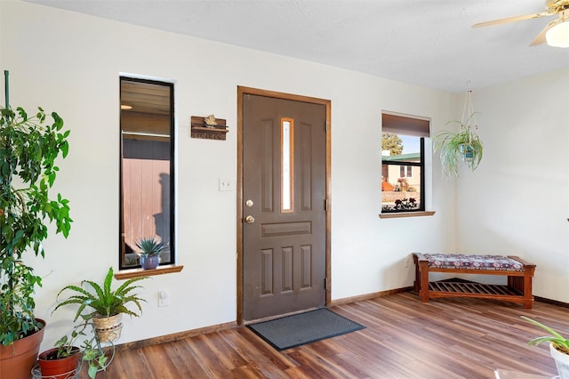 1043 Cheyenne, Los Alamos, NM 87544 - entryway with wood finished floors, baseboards, and a ceiling fan