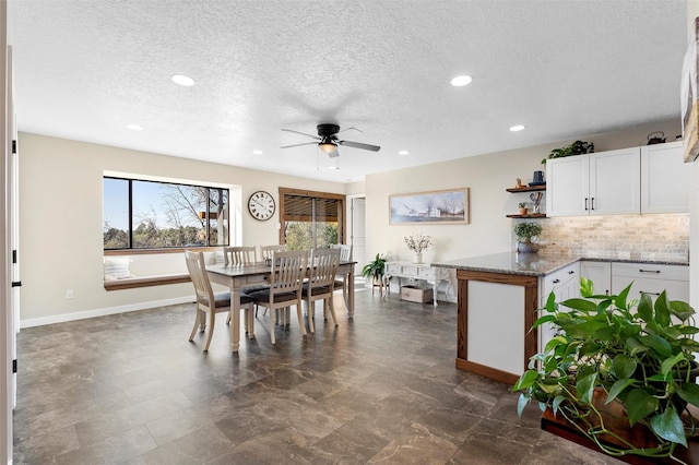 1043 Cheyenne, Los Alamos, NM 87544 - dining space with ceiling fan, recessed lighting, a textured ceiling, and baseboards