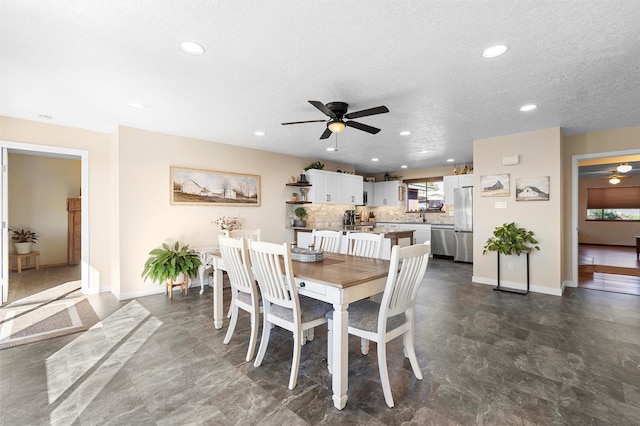 1043 Cheyenne, Los Alamos, NM 87544 - dining area with ceiling fan, baseboards, recessed lighting, and a textured ceiling