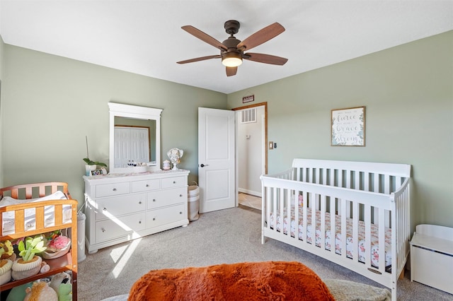 1043 Cheyenne, Los Alamos, NM 87544 - bedroom featuring light colored carpet, a nursery area, and ceiling fan